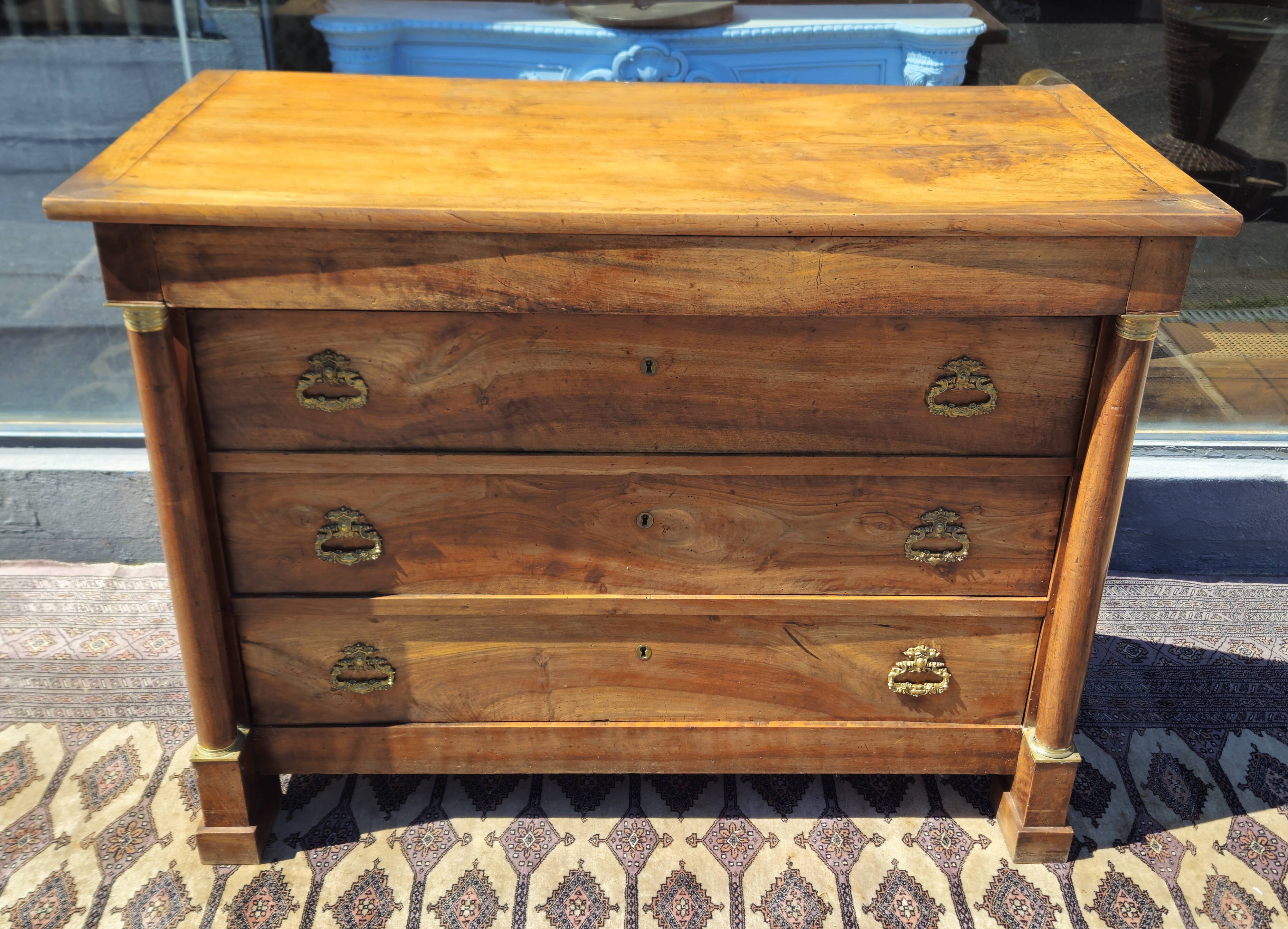 Empire walnut commode with detached columns – early 19th century