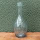 Biot blown glass bottle