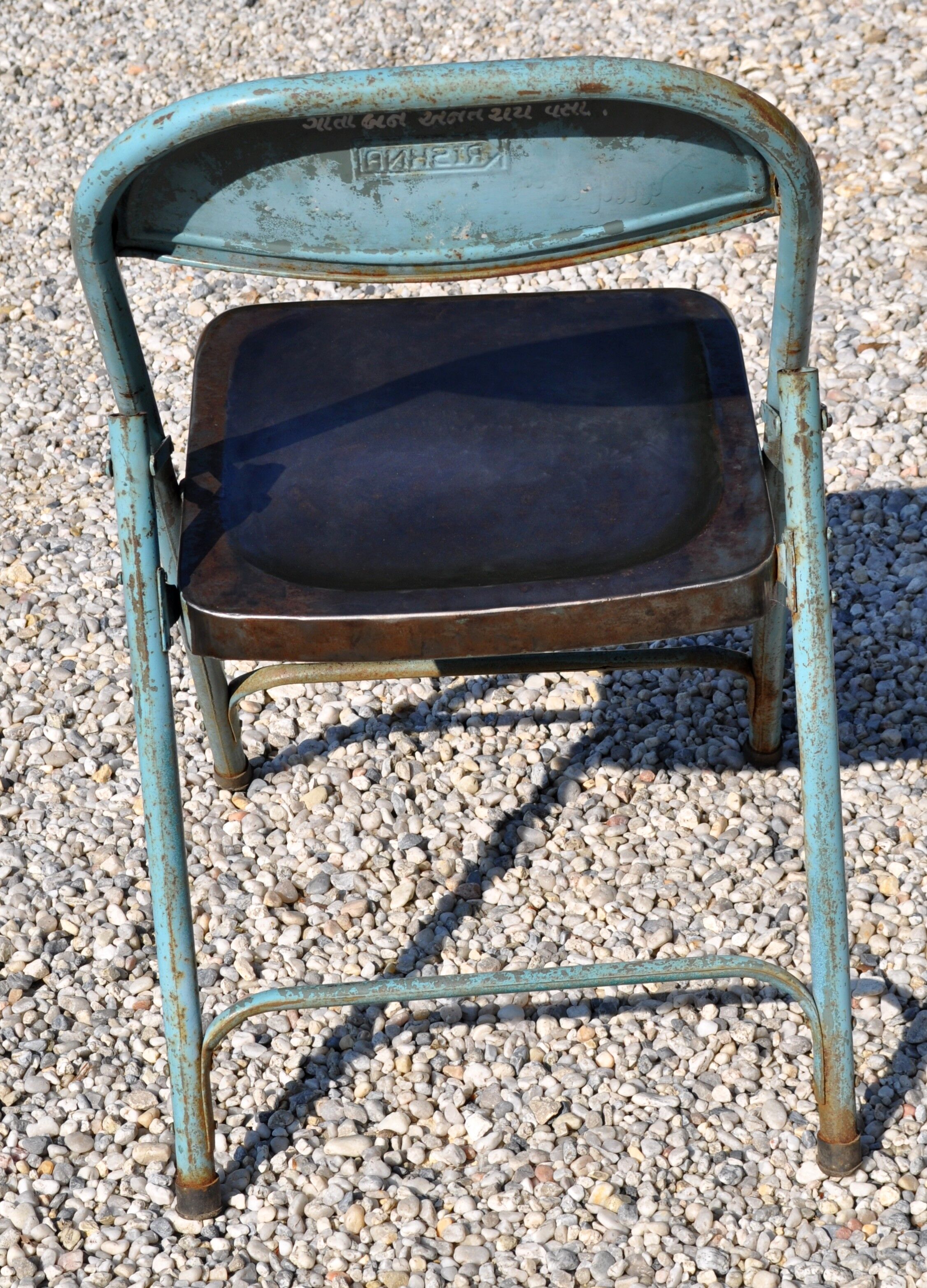 Unique folding metal chair