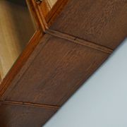 German oak bookcase with folding doors, ca 1900