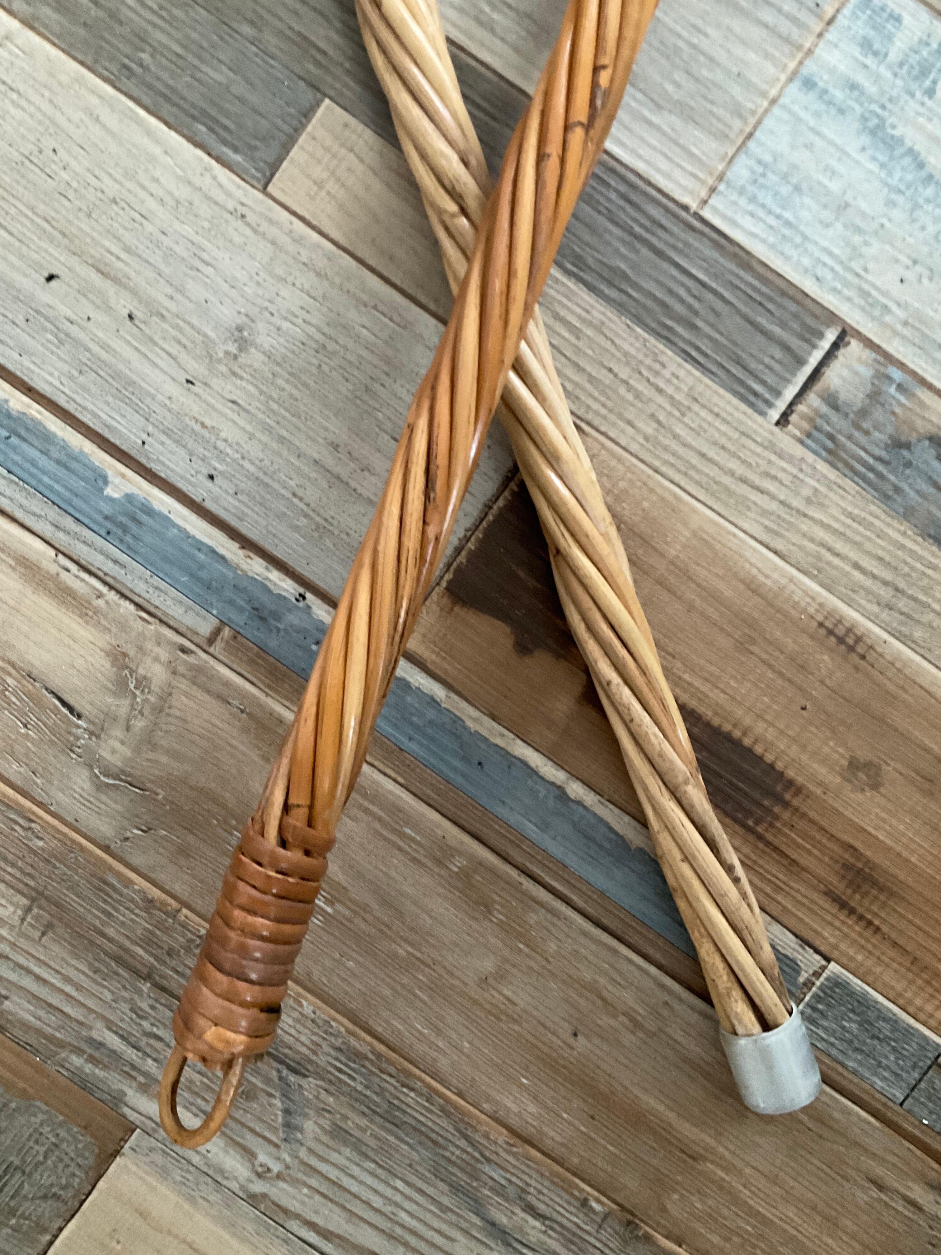 Duo of vintage rattan carpet beaters from the 70s
