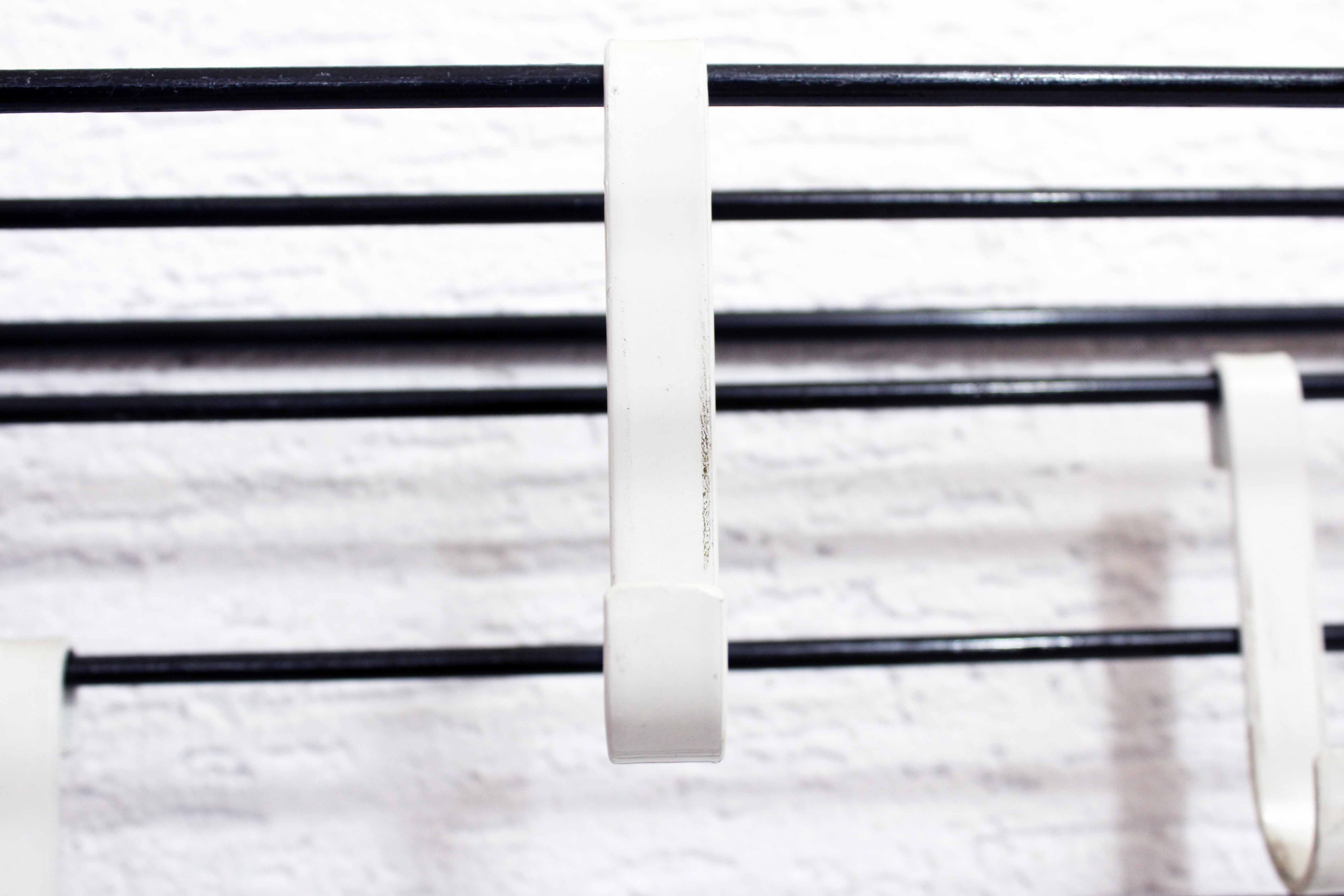 Wall coat rack with removable hooks