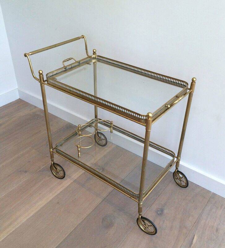 Neoclassical brass trolley with removable trays.