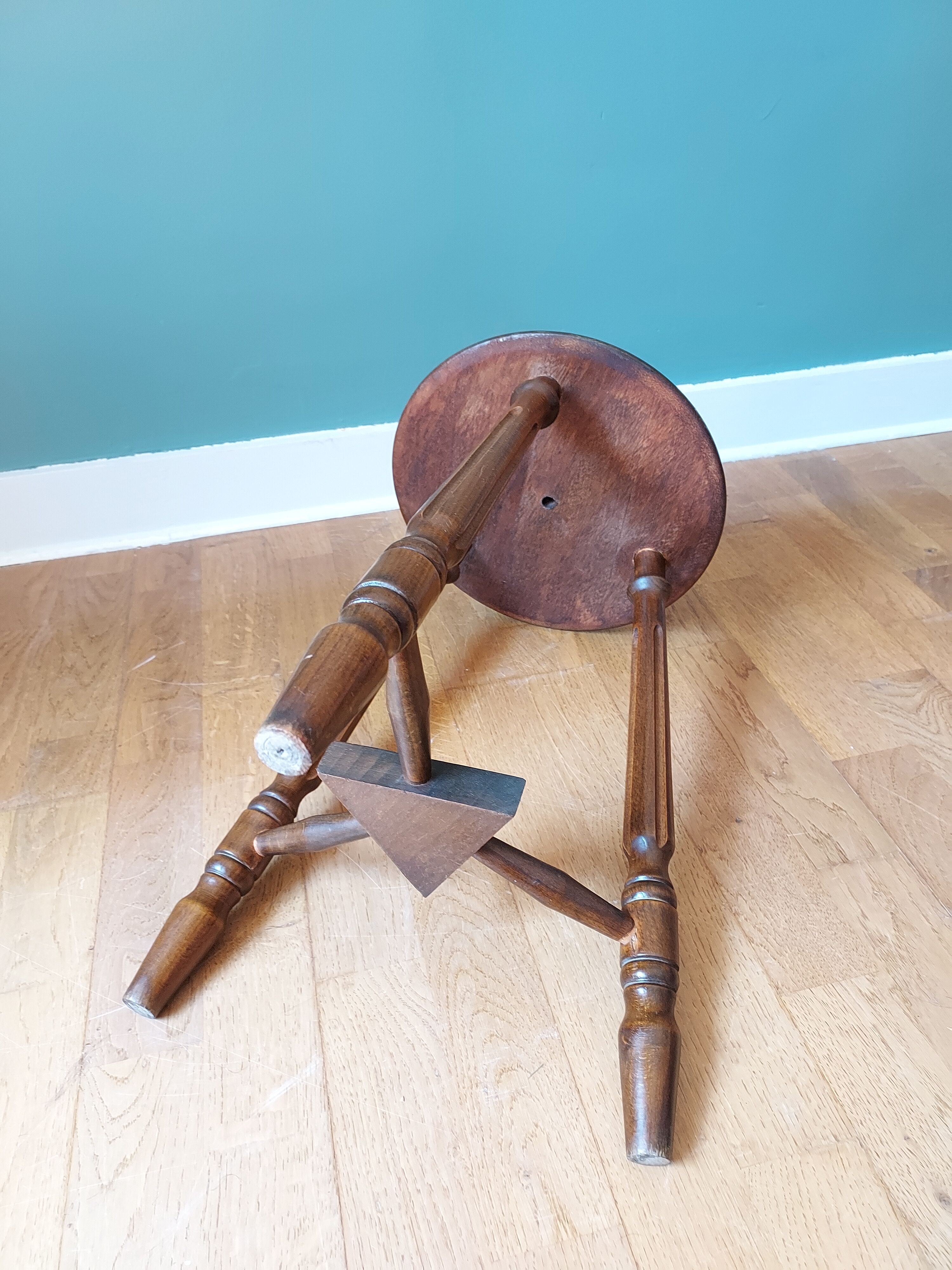 Carved tripod stool