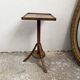 Old primitive wooden tripod pedestal table
