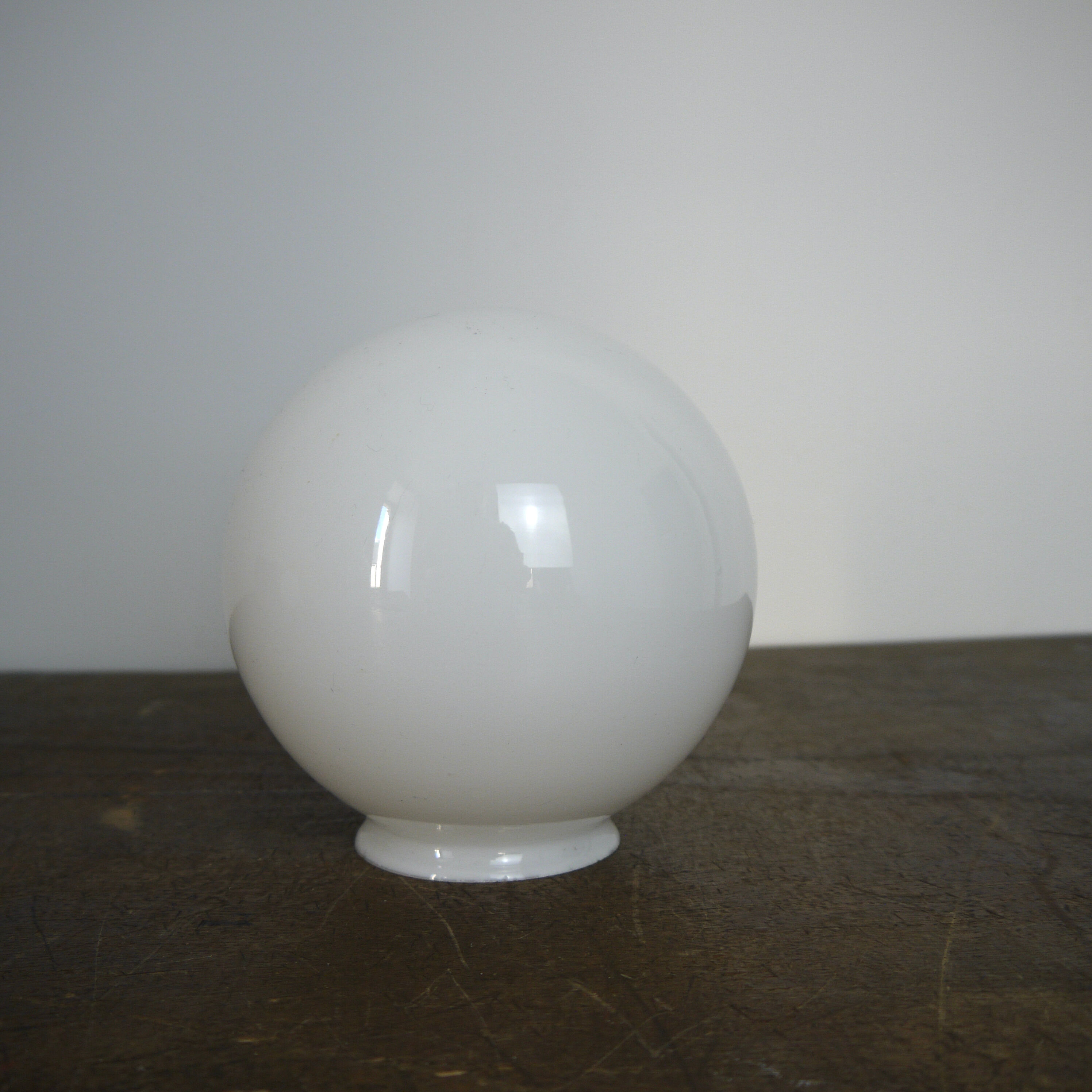 White glass globe '13