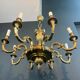 Important bronze chiseled chandelier in Louis XVI style with 8 light arms by Lucien Gau.
