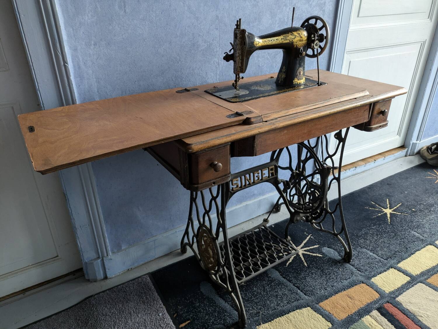 Singer sewing machine with pedal