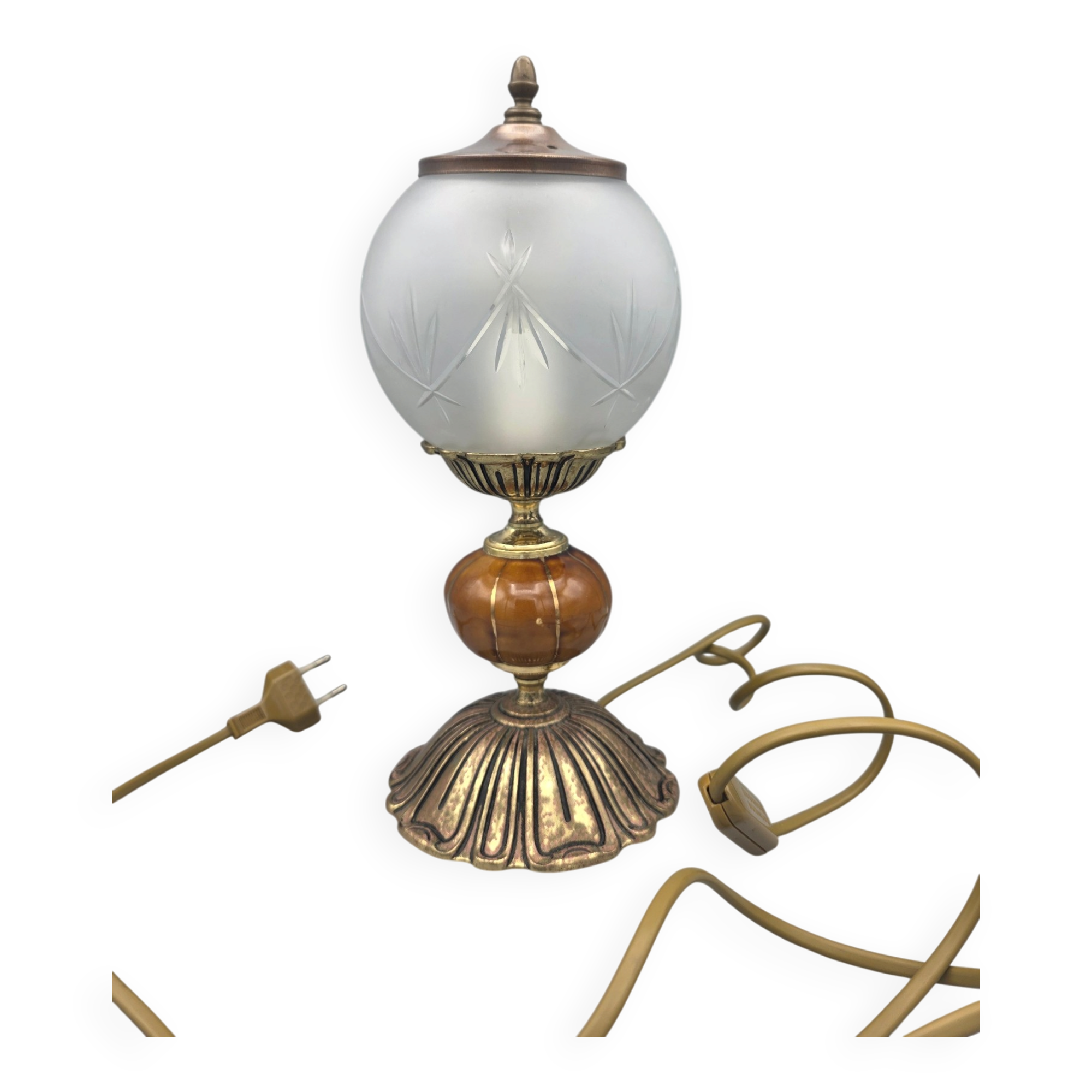 Hollywood Regency bedside lamp in gold metal with a glass globe.