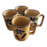 Set of 4 floral decorated mugs