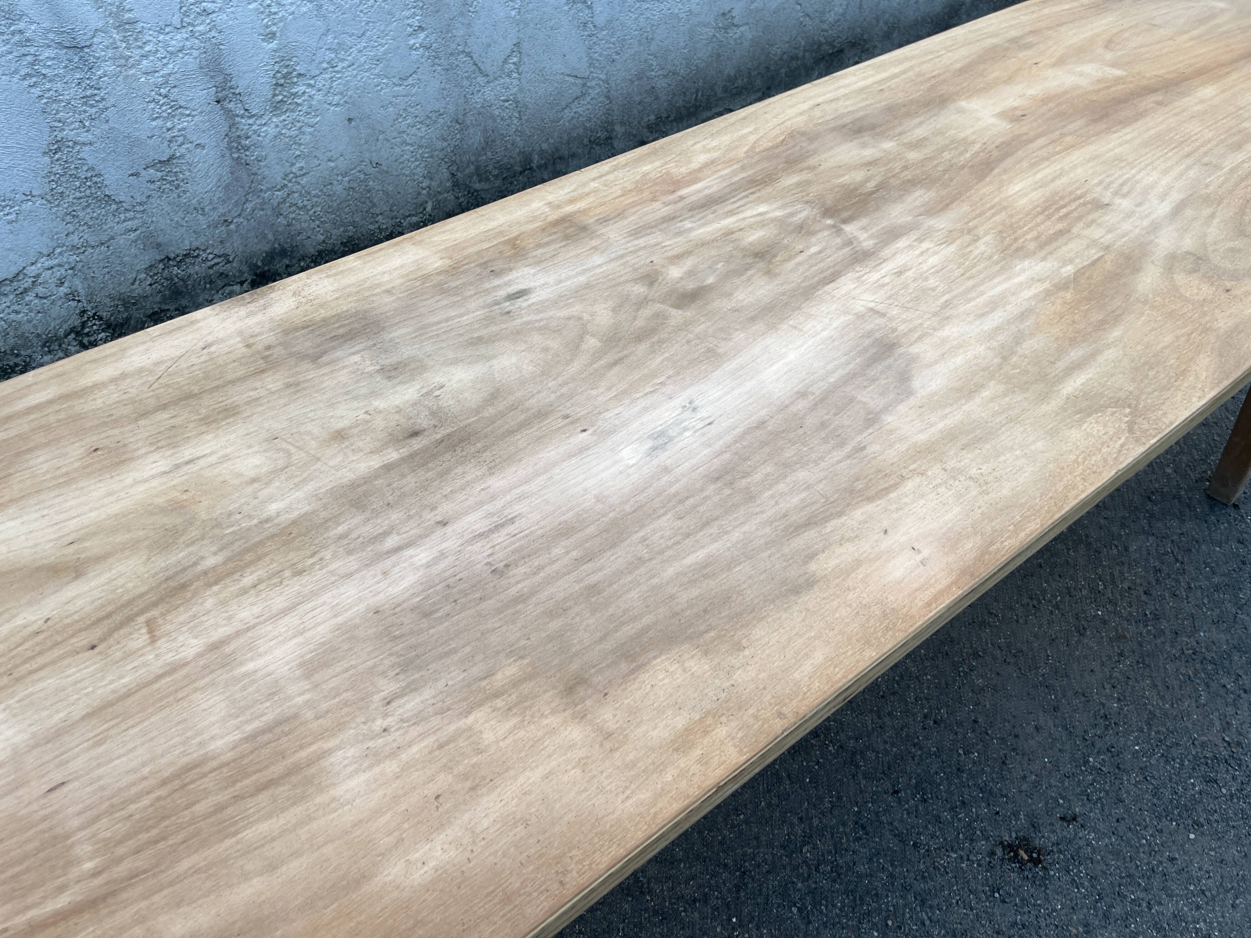 Large table 3 metres, tapered wooden legs, sanded top.