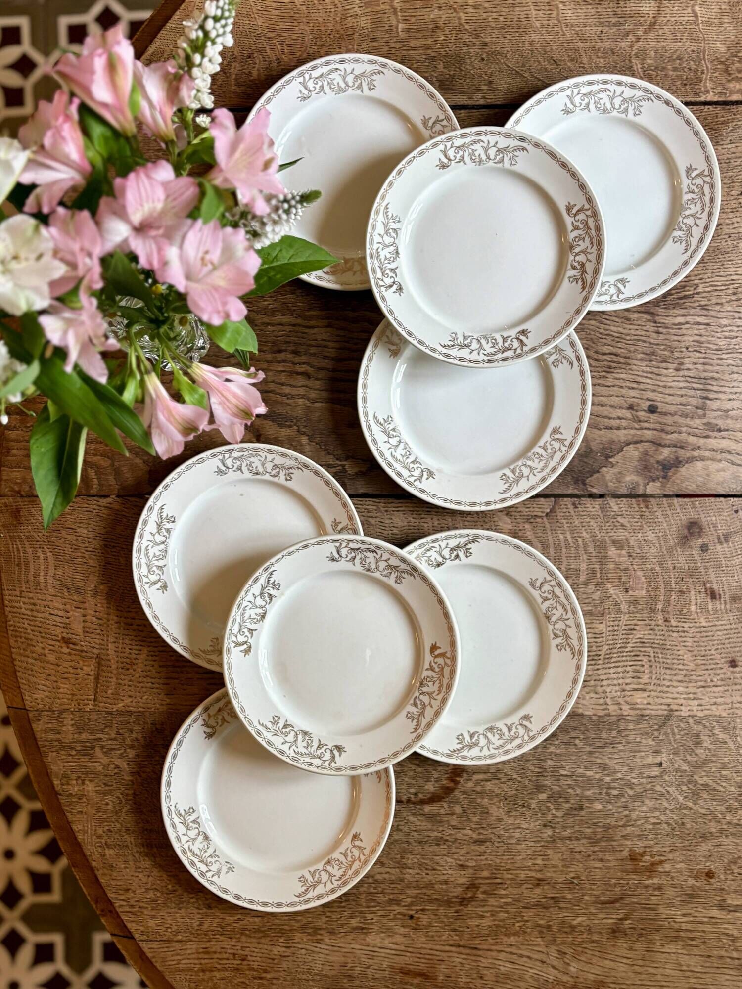 Set of 8 vintage white and gold dessert plates.