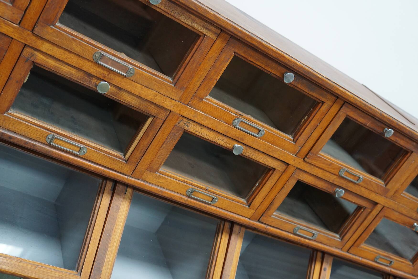 Very large Dutch oak showcase for grocery or haberdashery, 1920s-1930s