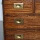 Reprodux Bevan Funnell chest of drawers with a leather top