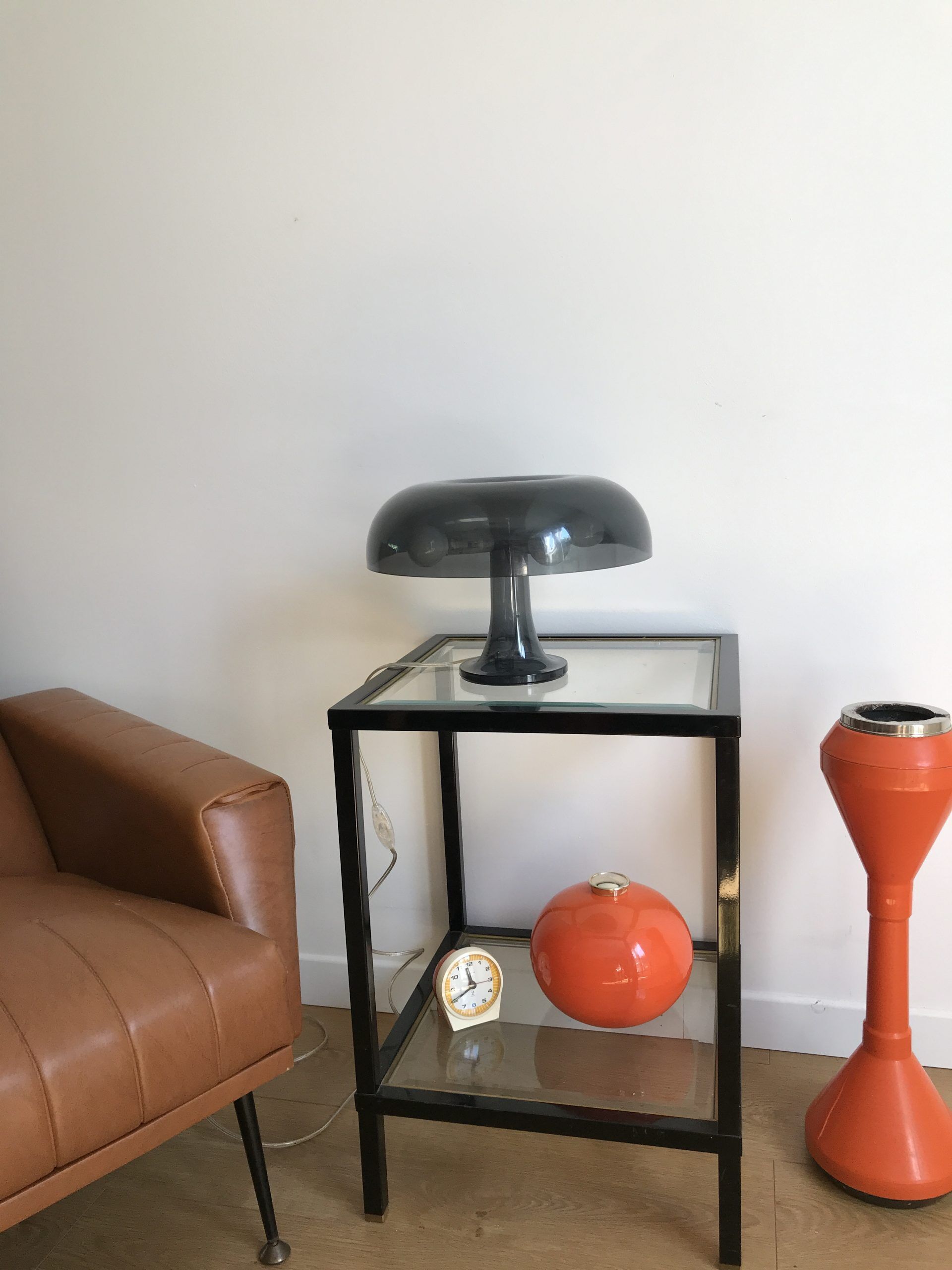Nessino black pose lamp for artemide by giancarlo mattioli