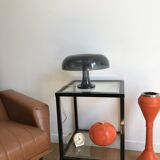 Nessino black pose lamp for artemide by giancarlo mattioli