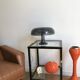 Nessino black pose lamp for artemide by giancarlo mattioli