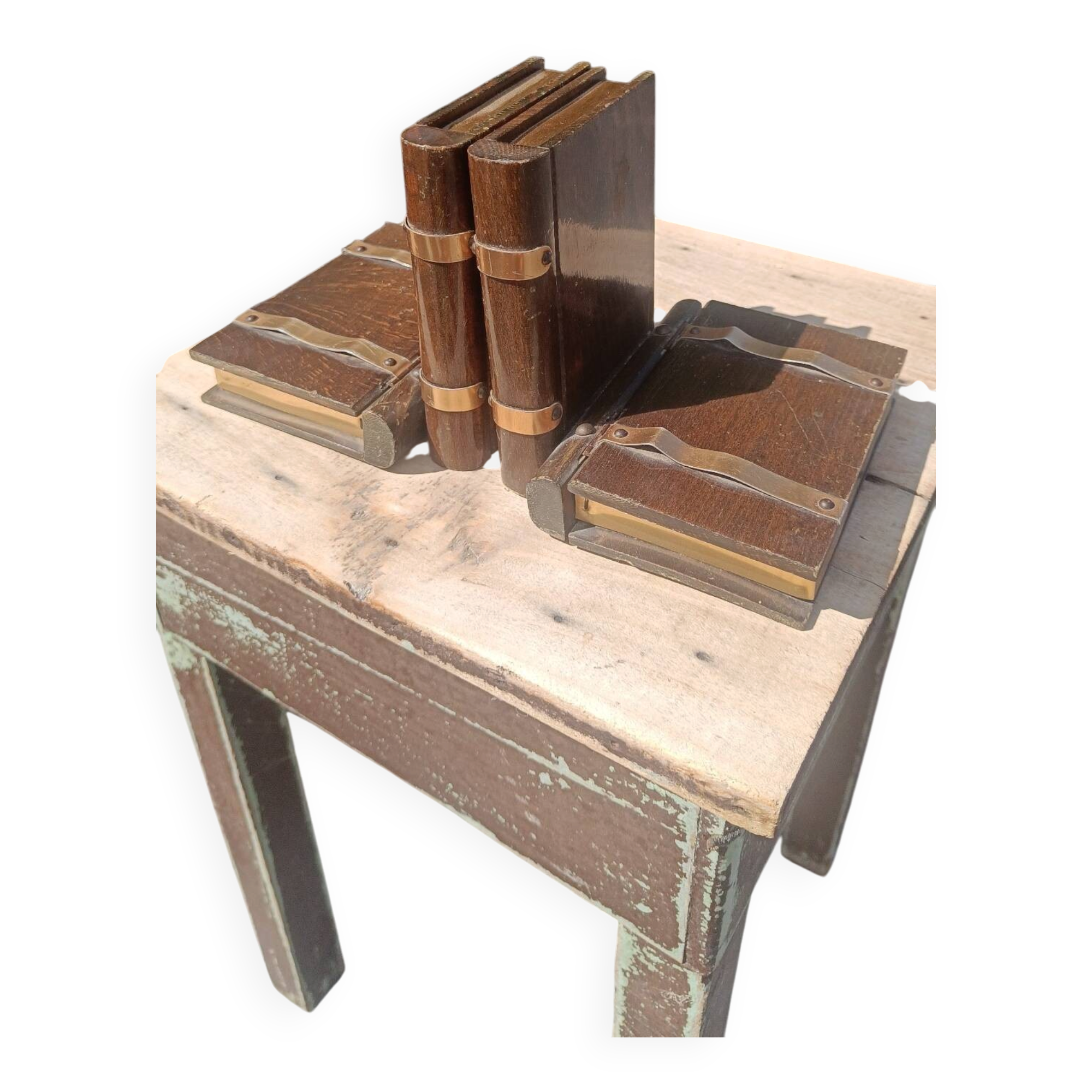 Wooden trompe-l'œil bookends with a book and box