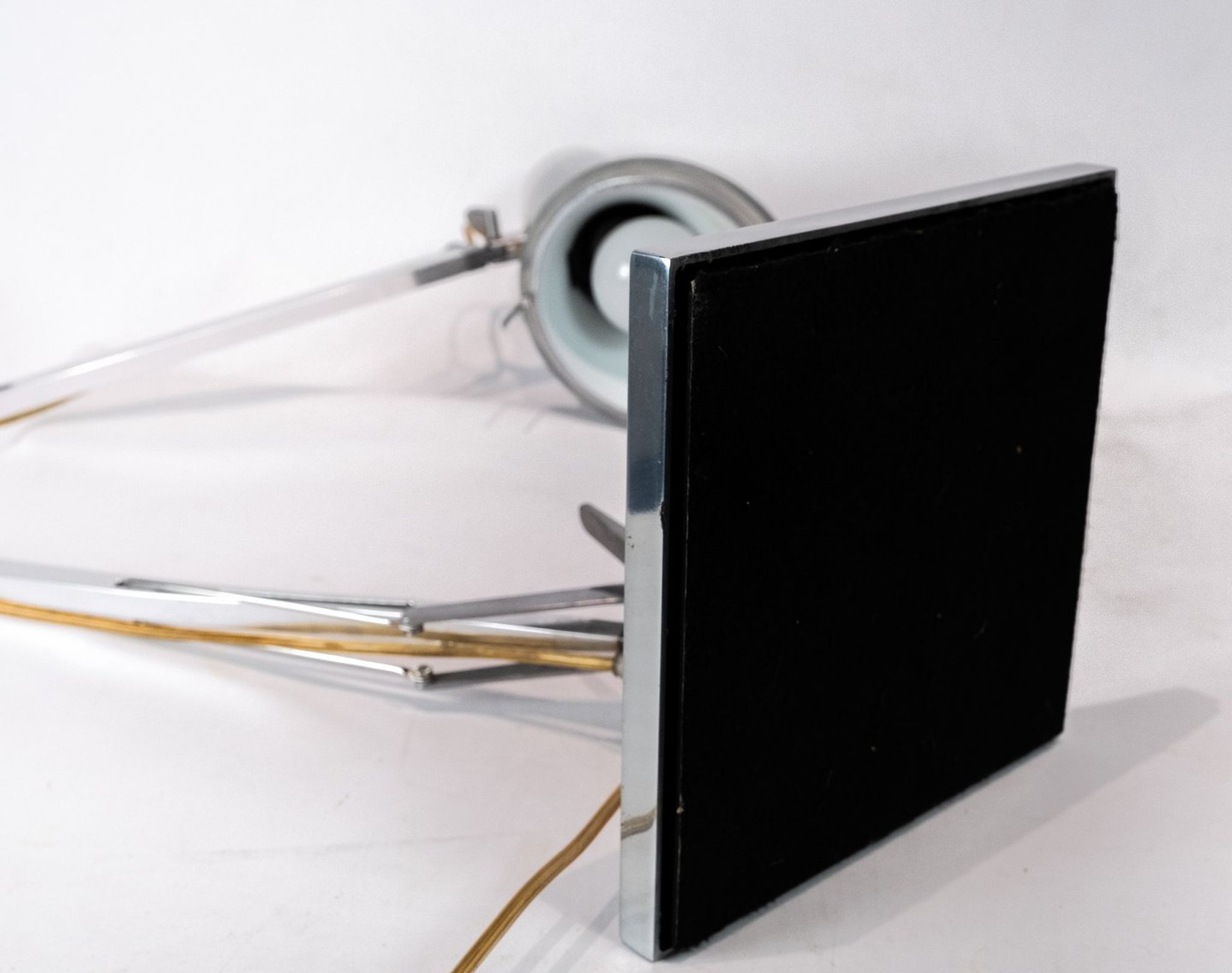 Table lamp of stainless steel and of italian design by Flos