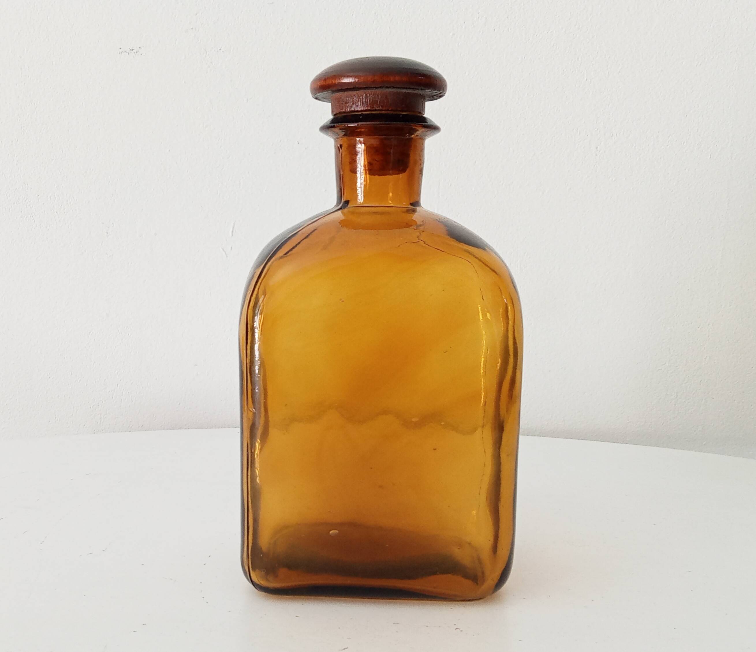 Vintage amber glass apothecary bottle