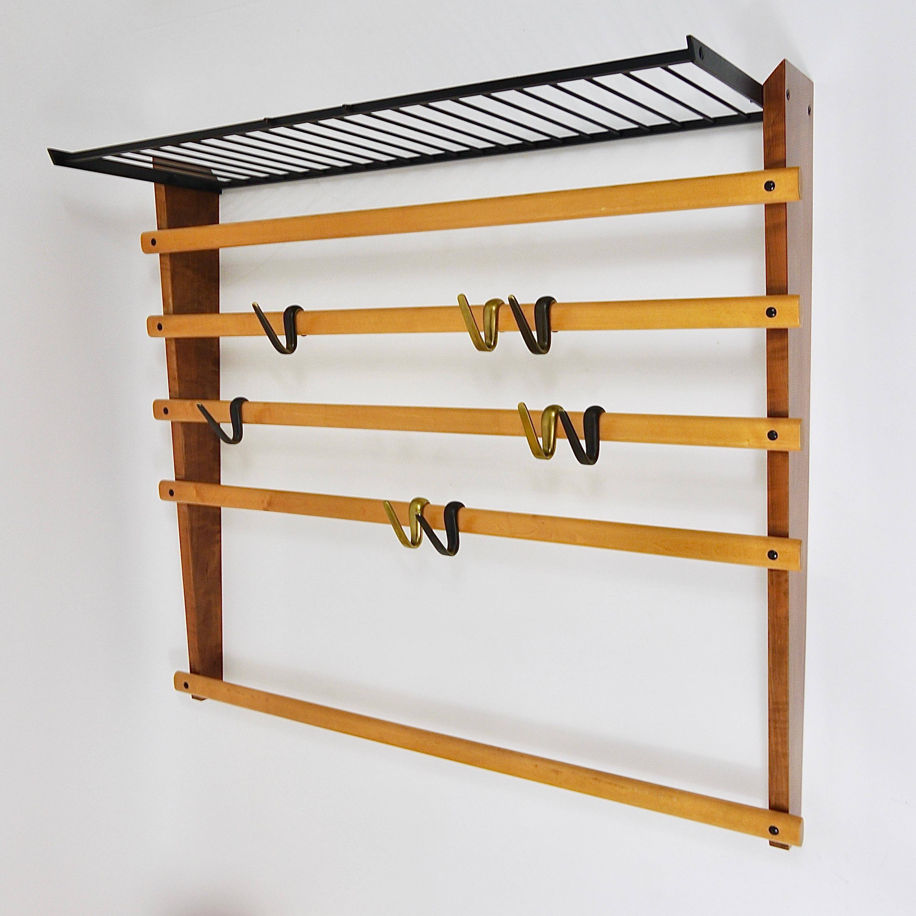 Rare coat rack by Carl Auböck with hat rack, cabinet, brass, walnut and beech, 1950s.
