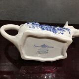 English porcelain cow-shaped sauce dish