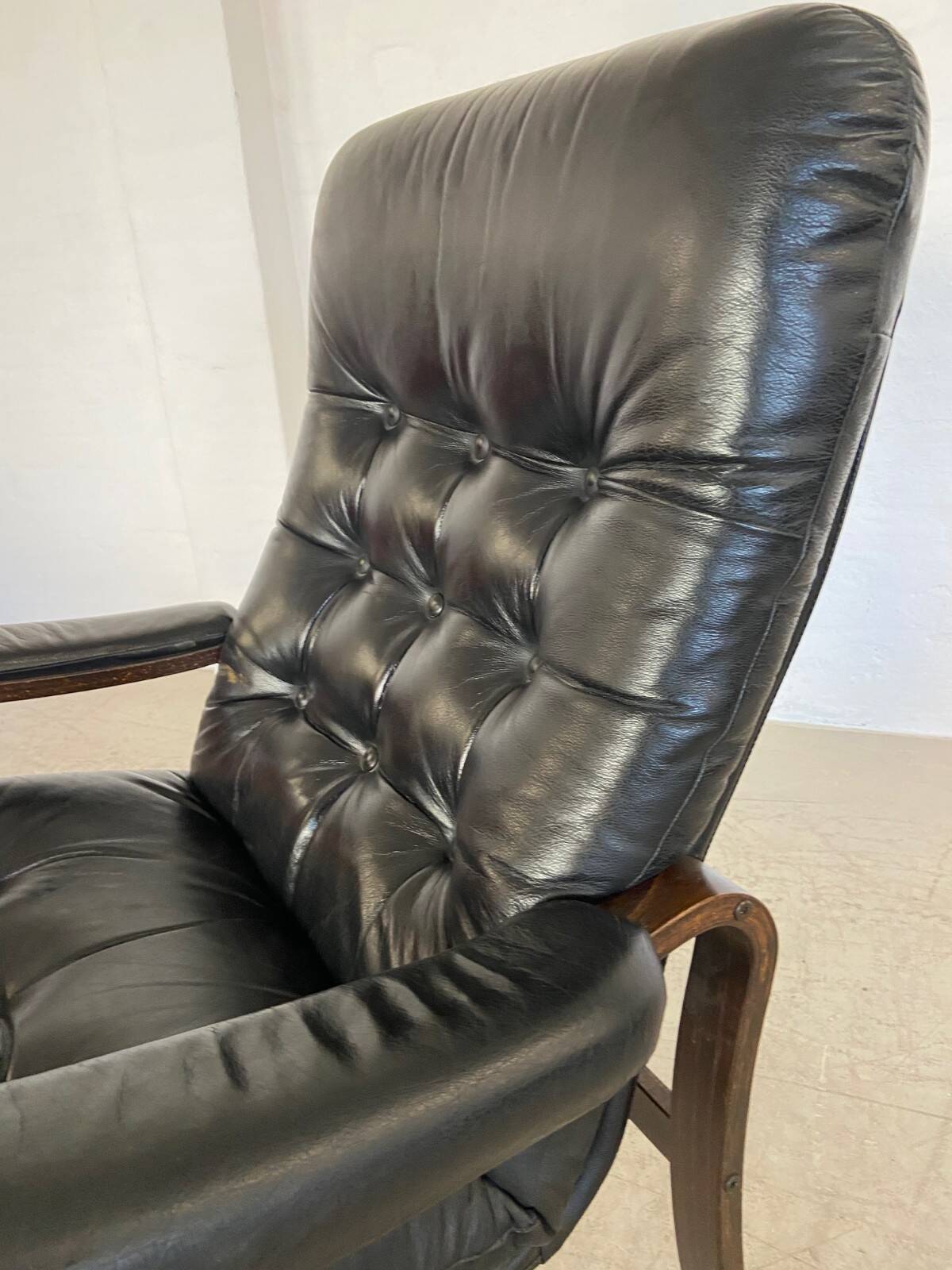 Vintage mid-century Scandinavian black leather lounge chair 1970s