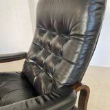 Vintage mid-century Scandinavian black leather lounge chair 1970s