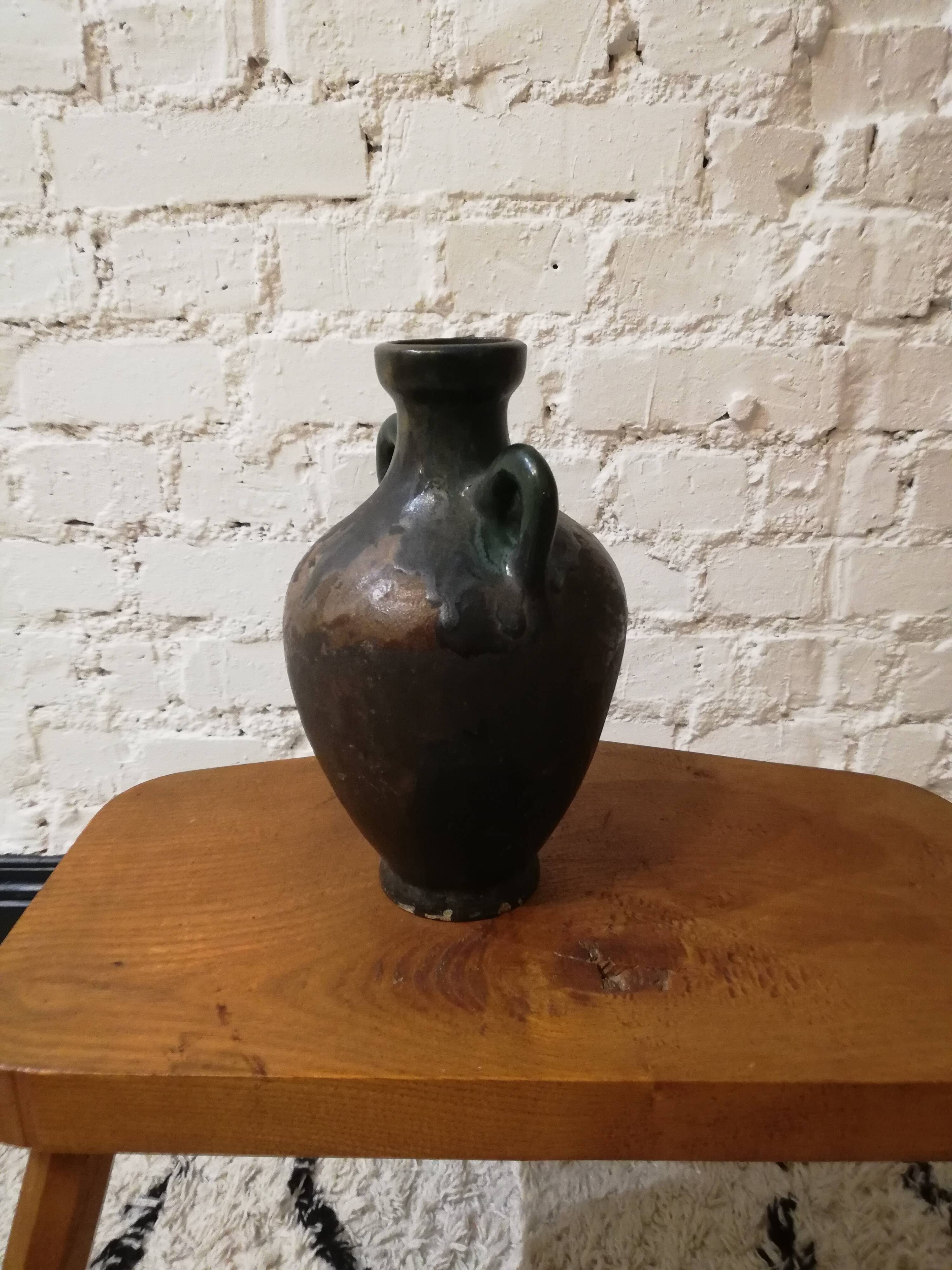 Old glazed terracotta vase