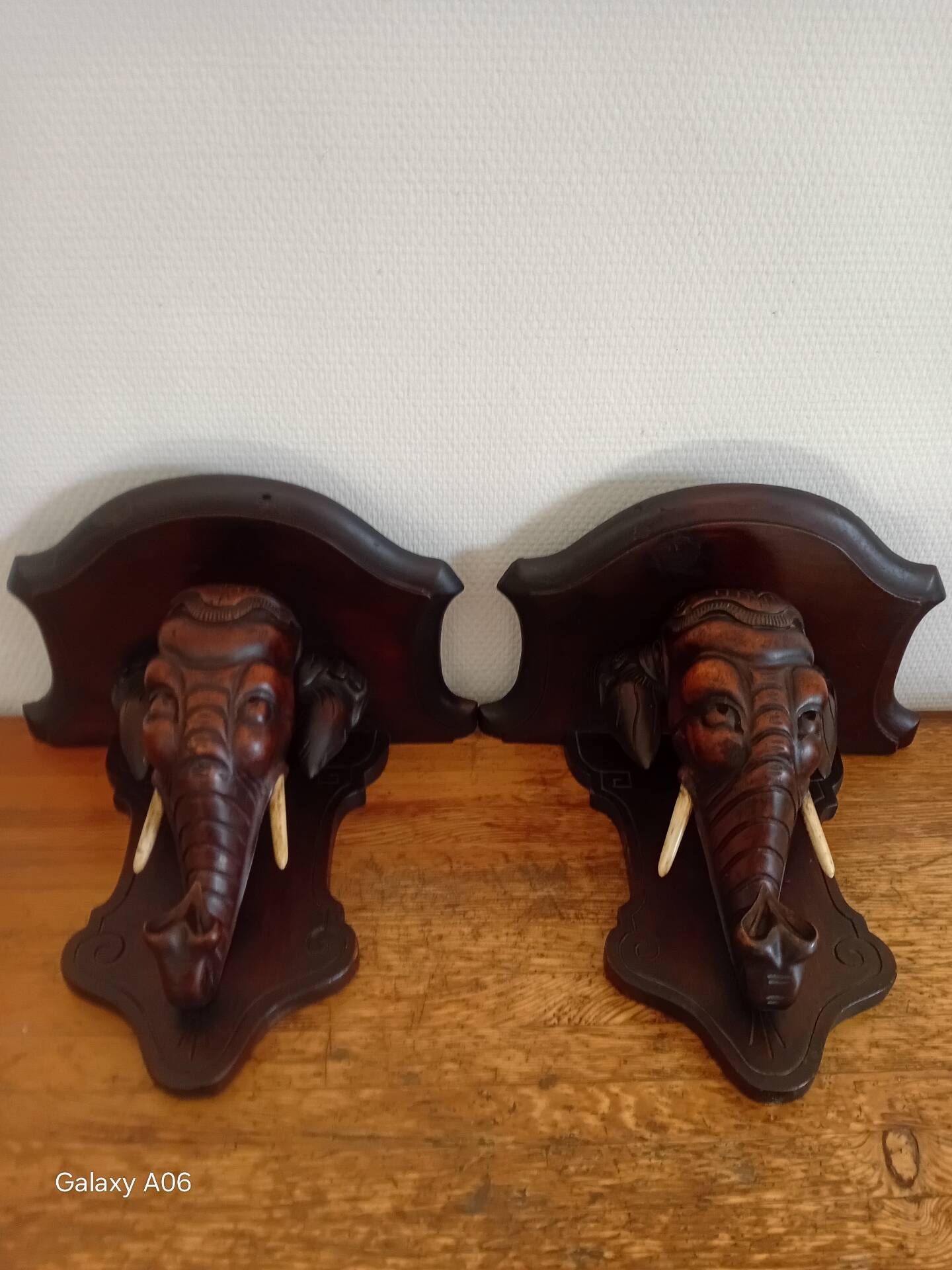 Rare pair of wall-mounted consoles Elephant carved wood J. Derolland