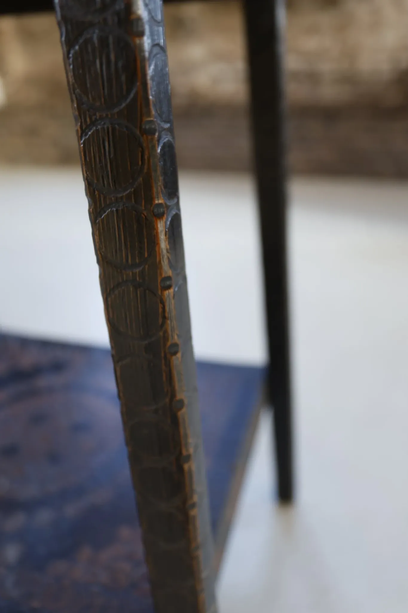 Decorated antique side table with elephant