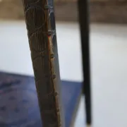 Decorated antique side table with elephant