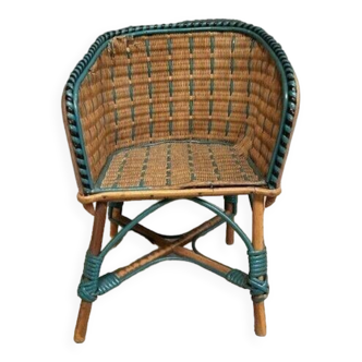 Small children's armchair in woven rattan for dolls, early 20th century