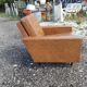 Fauteuil années 60 skai marron