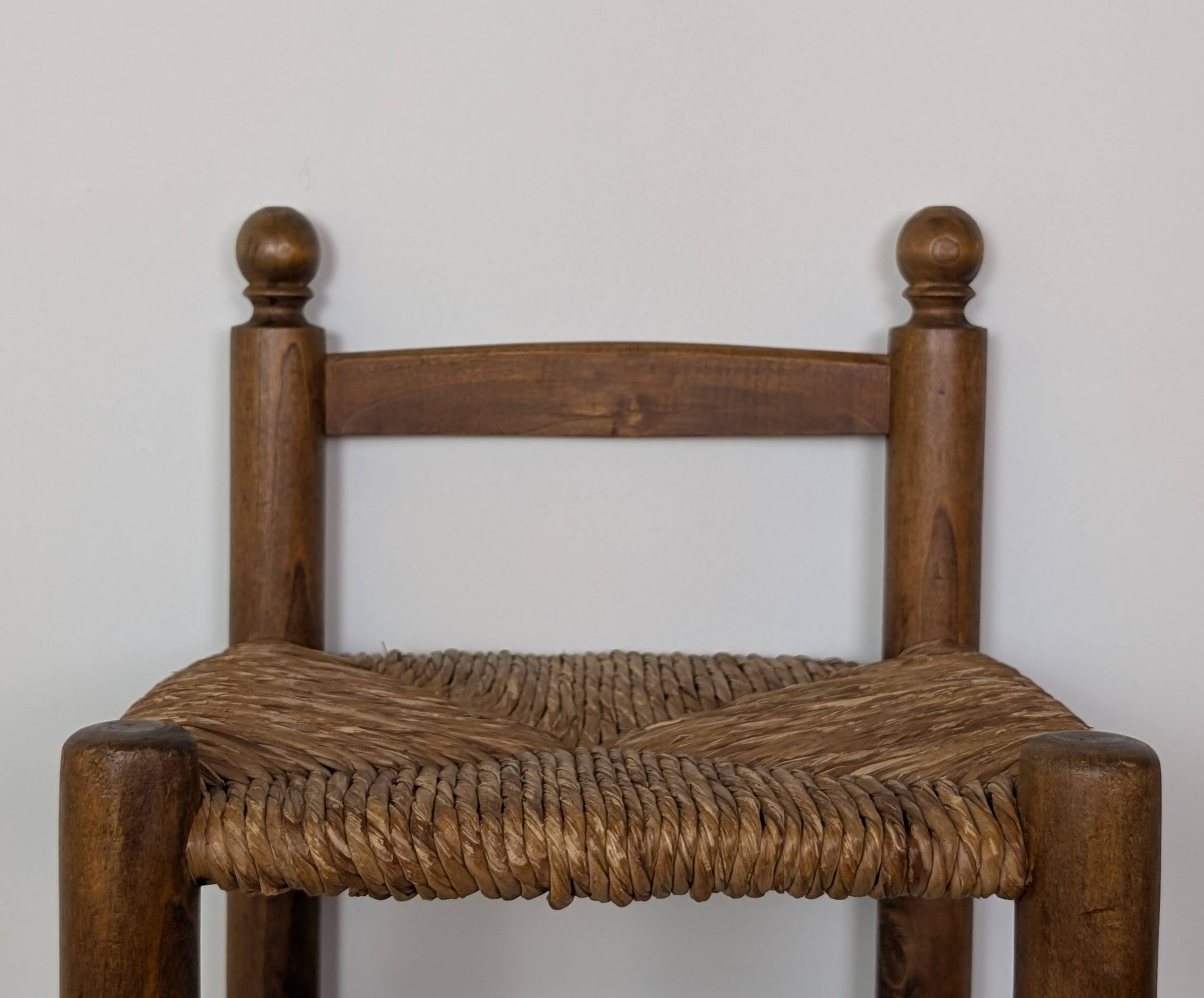 High wooden and straw stools