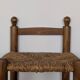 High wooden and straw stools