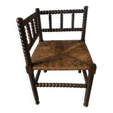 Fauteuil bois tourné coin du feu