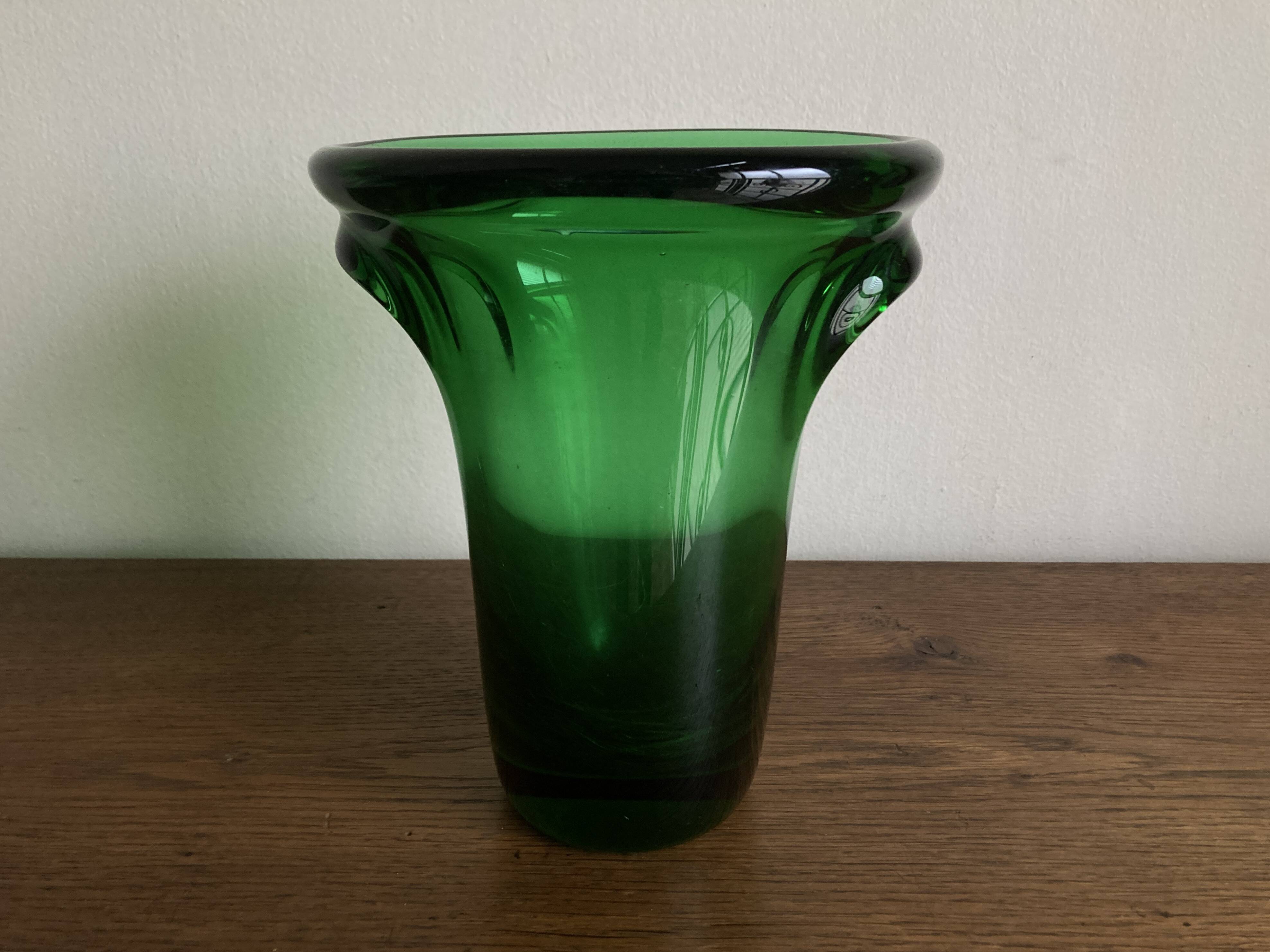 1950s Médicis vase, large Art Deco with handles, made of green blown glass.