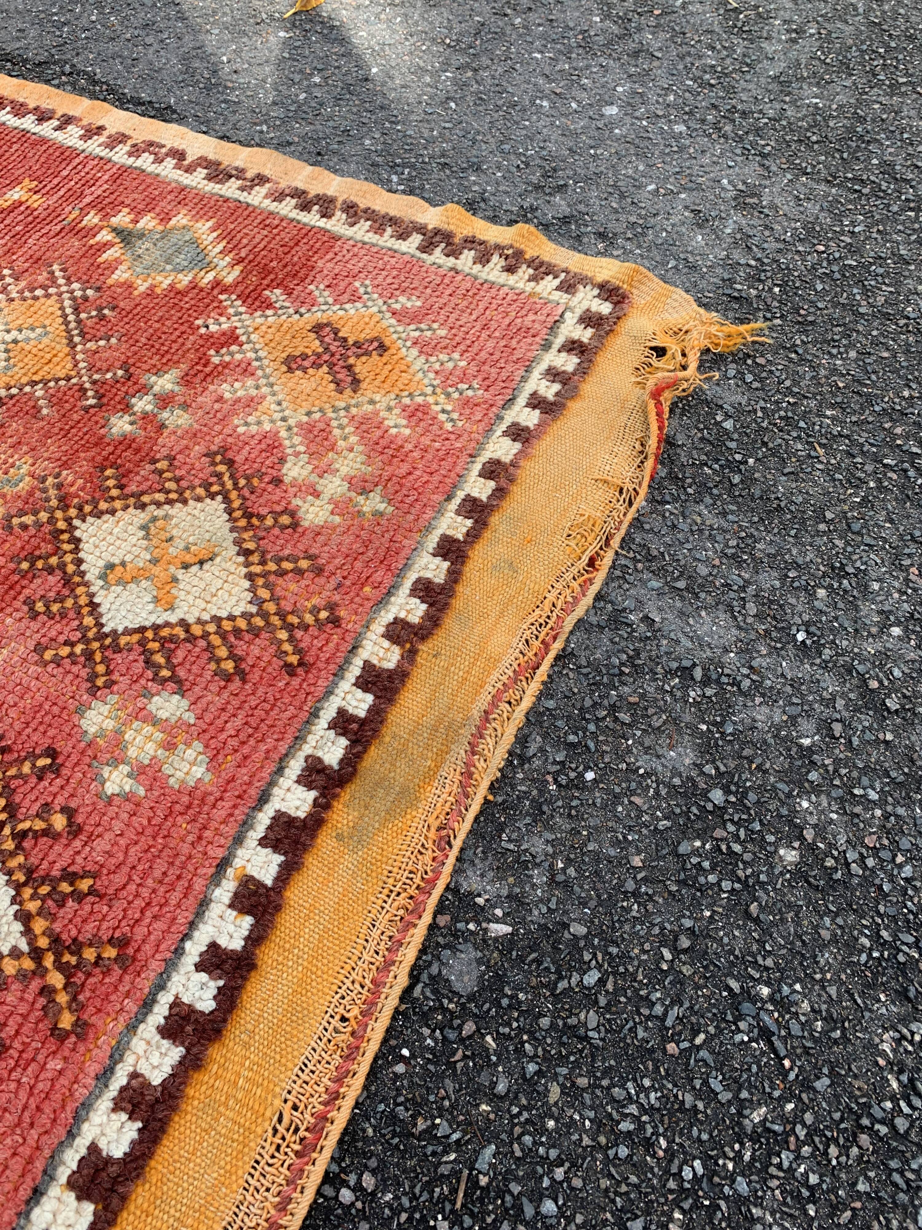 Old orange kilim carpet