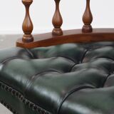 Dark green chesterfield office chair in cowhide leather on wheels