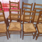 8 wooden chairs, straw seat