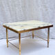 Vintage side table in gold metal and veined white marble.