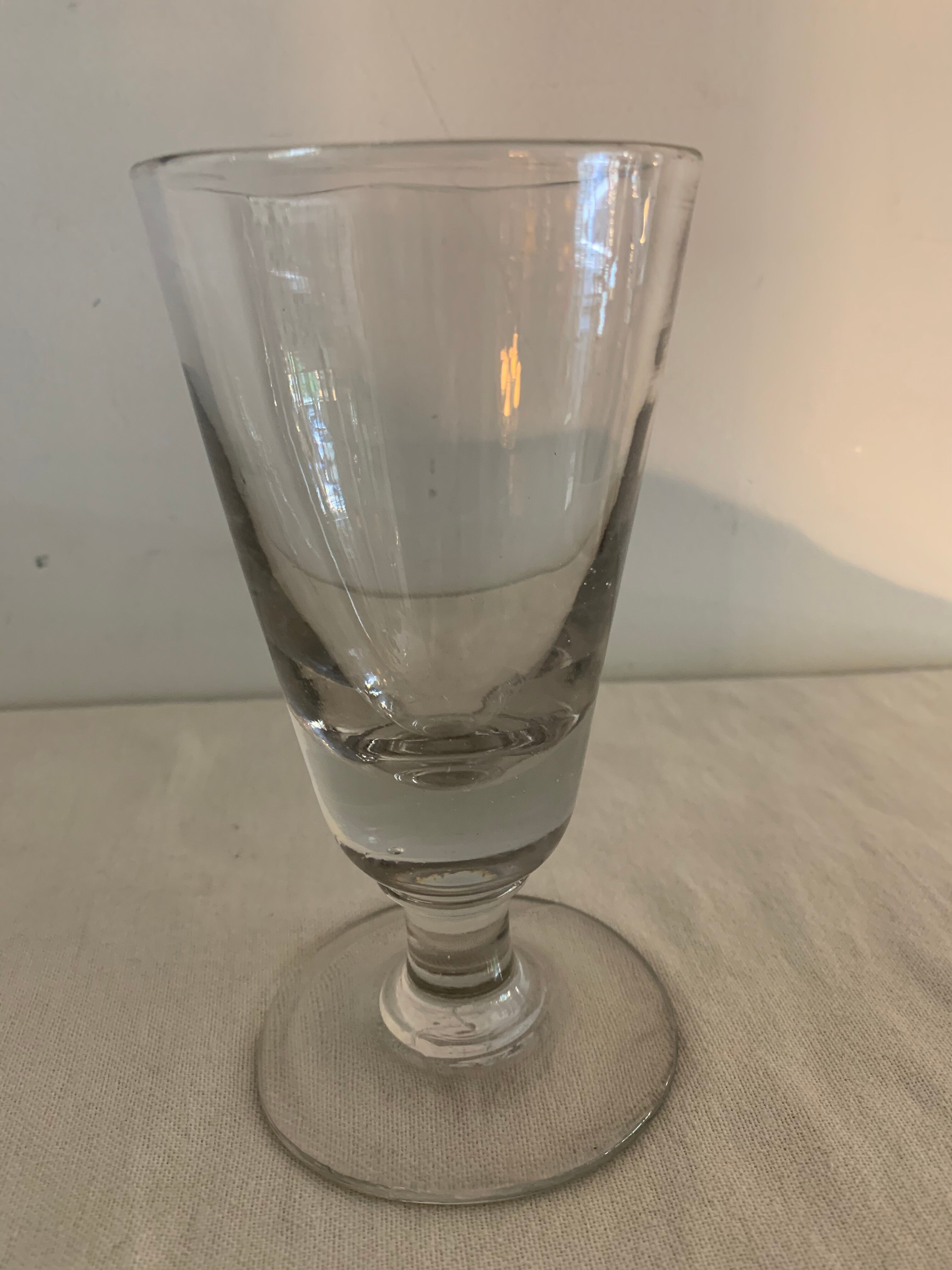 8 old blown and different foot wine glasses
