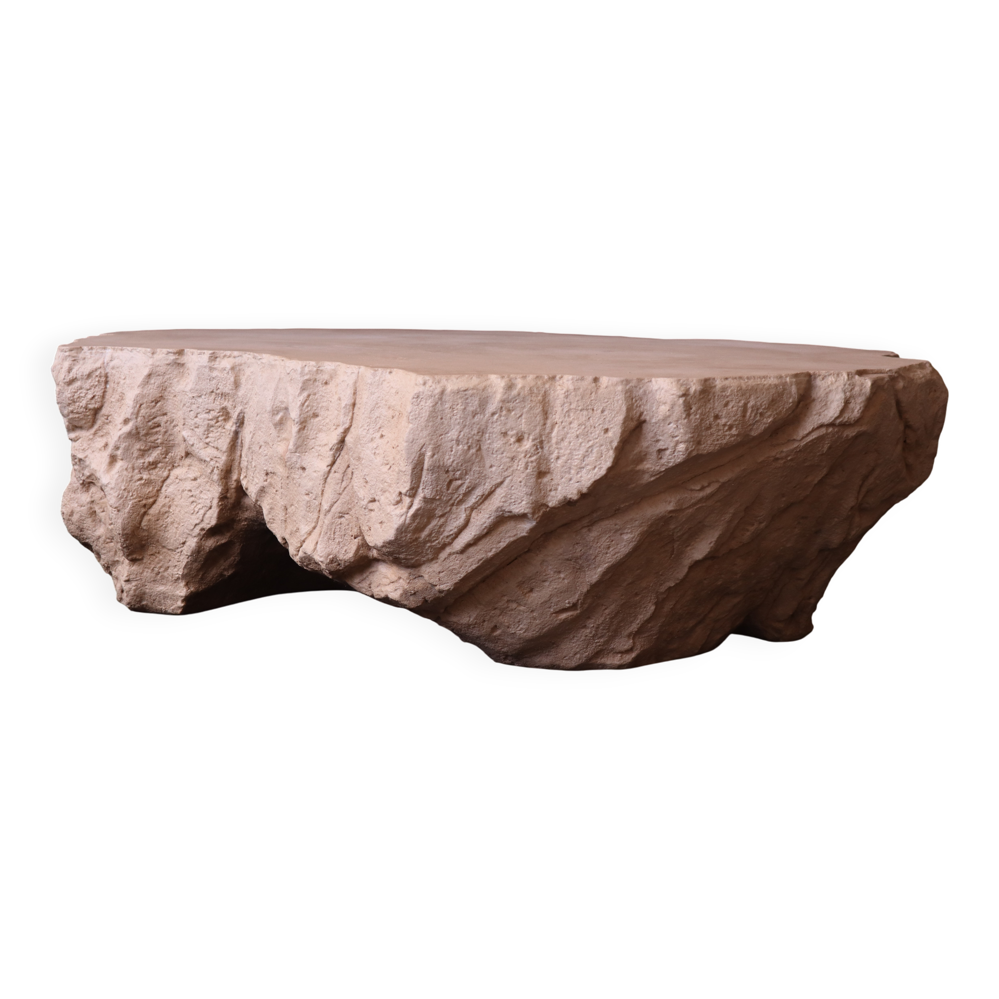 Designer coffee table with travertine rock effect — unique handcrafted piece.
