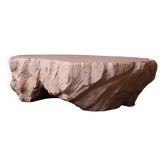 Designer coffee table with travertine rock effect — unique handcrafted piece.