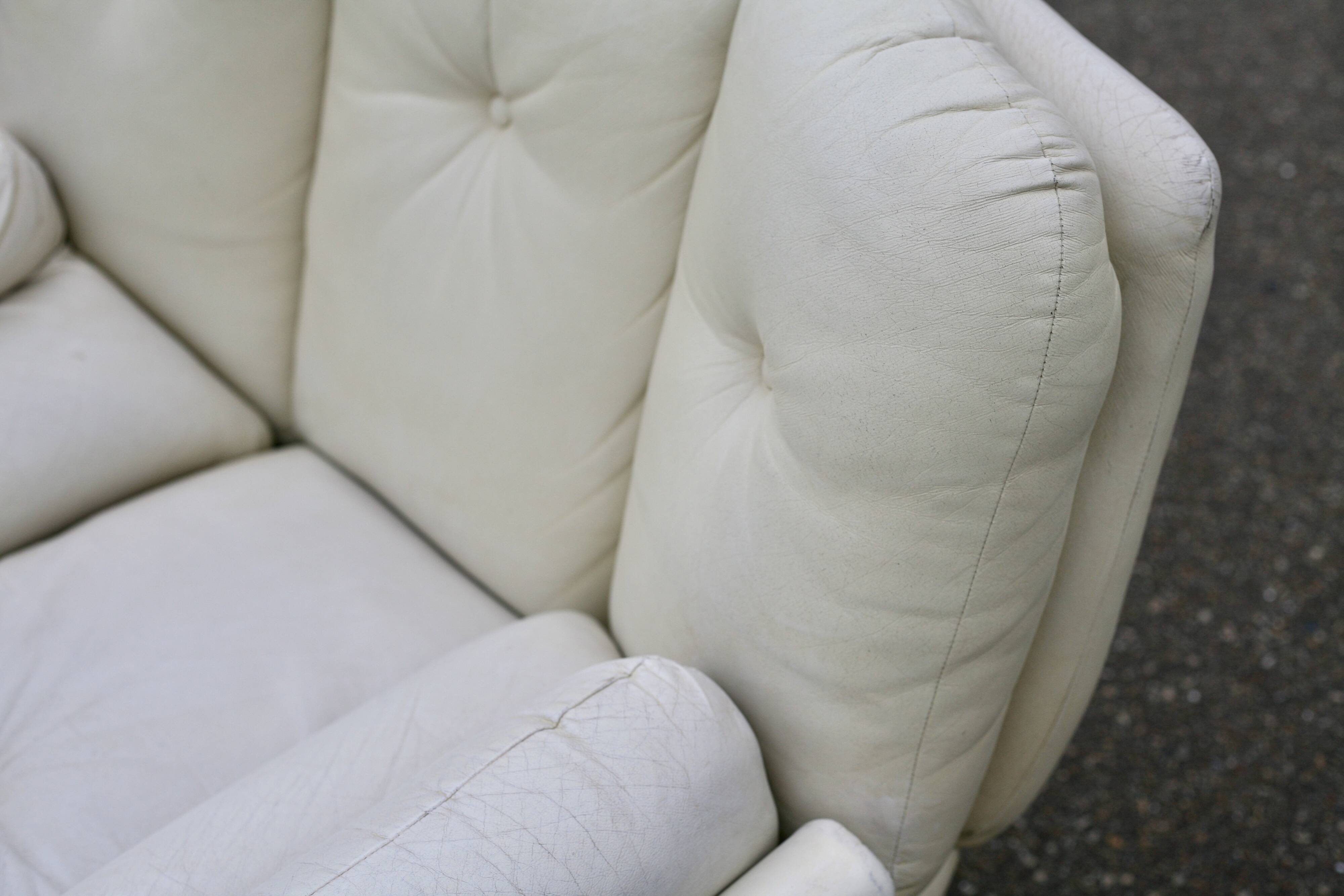 Pair of leather “space age” armchairs. Cream colour". Circa 1970.