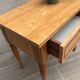 Formica and vintage wood bedside table
