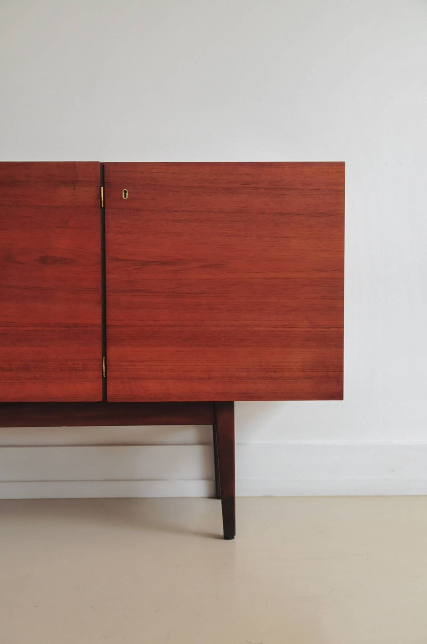 vintage Danish sideboard with black and white drawers