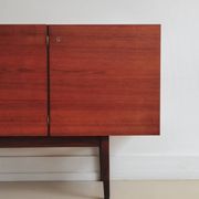 vintage Danish sideboard with black and white drawers
