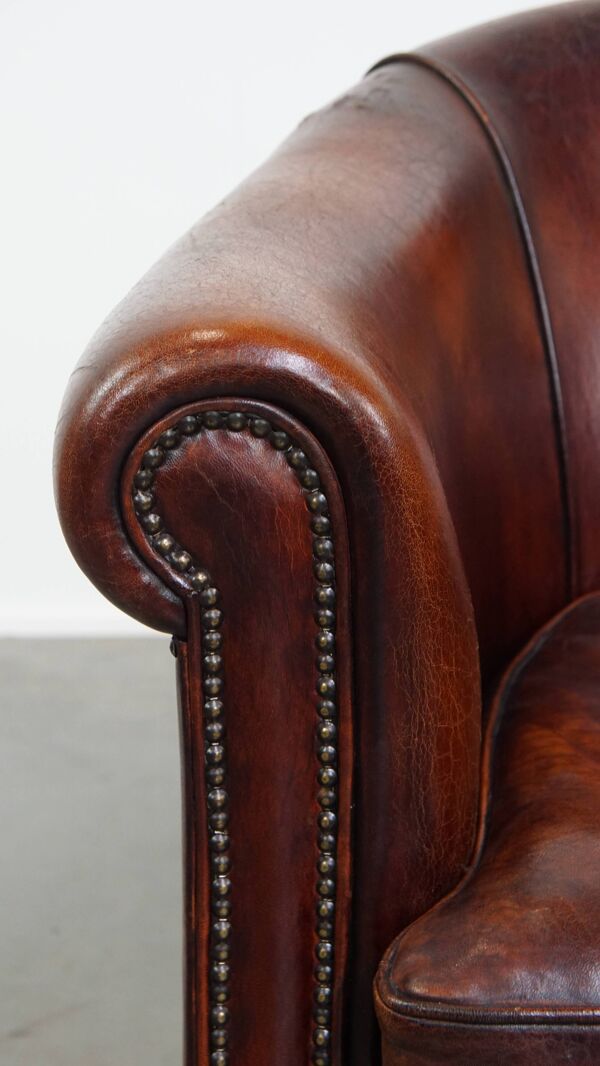 Fauteuil club en cuir de mouton couleur cognac